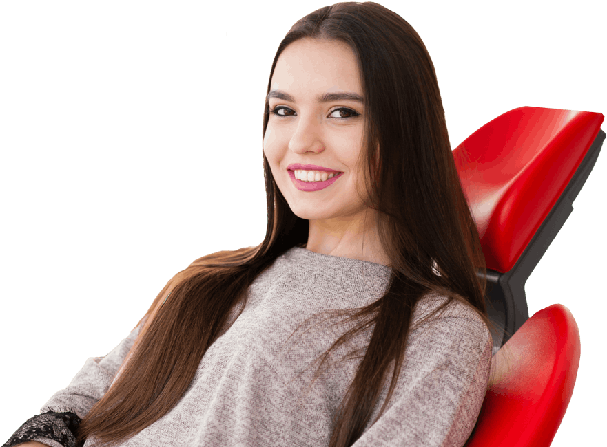 Girl smiling in a chair